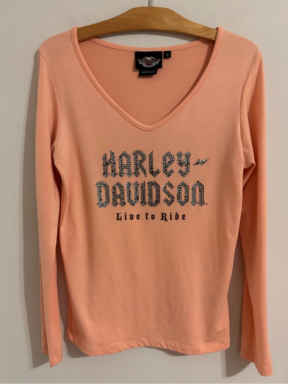 Harley-Davidson V-neck shirt featuring a rhinestone graphic